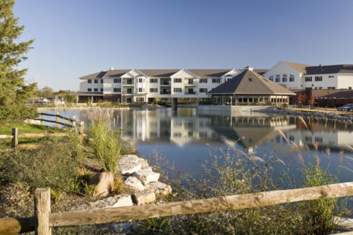 Willow Brook Delaware Run Senior Living Exterior with Pond